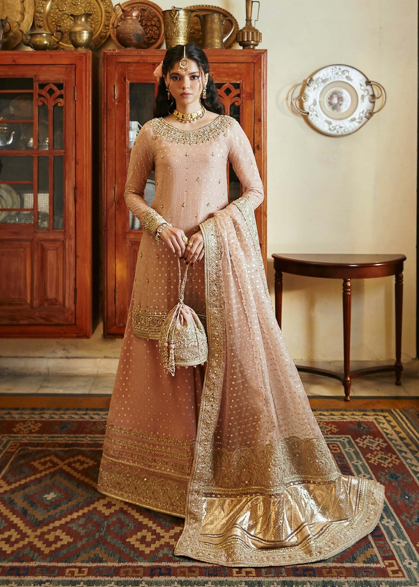 Model wearing blush pink Hala dress from Kanwal Malik, Afsheen Luxury Pret 2024 collection. Pakistani clothes online in UK, wedding clothes.