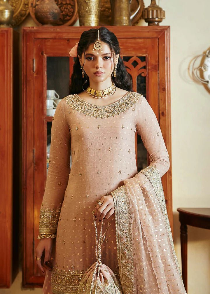 Model wearing blush pink Hala dress from Kanwal Malik, Afsheen Luxury Pret 2024 collection. Pakistani clothes online in UK, wedding clothes.