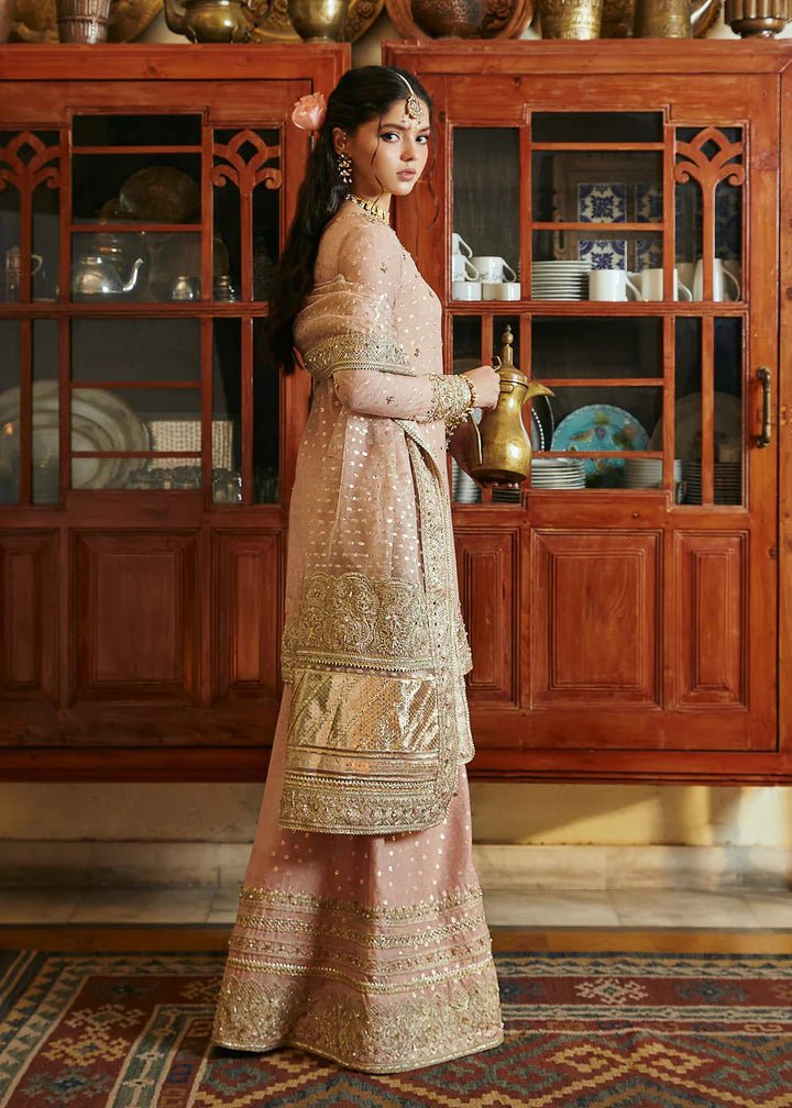 Model wearing blush pink Hala dress from Kanwal Malik, Afsheen Luxury Pret 2024 collection. Pakistani clothes online in UK, wedding clothes.