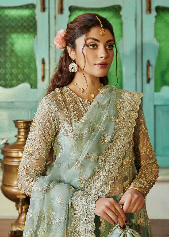 Model wearing light green Meera dress from Kanwal Malik, Afsheen Luxury Pret 2024 collection. Pakistani wedding clothes online in UK, elegant fashion.