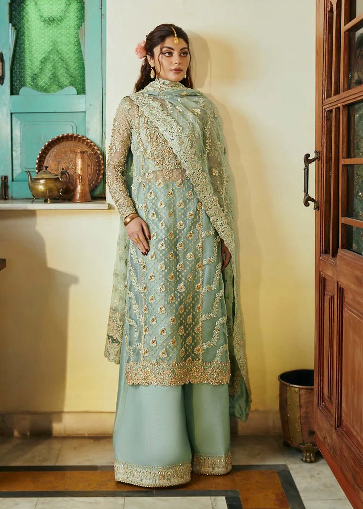 Model wearing light green Meera dress from Kanwal Malik, Afsheen Luxury Pret 2024 collection. Pakistani wedding clothes online in UK, elegant fashion.