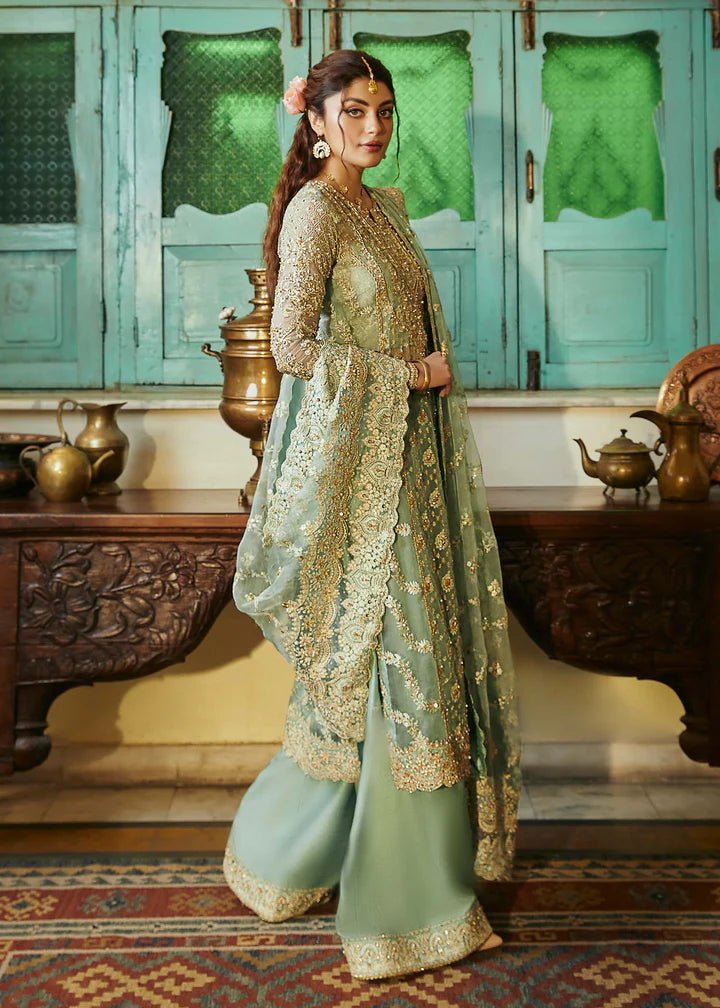 Model wearing light green Meera dress from Kanwal Malik, Afsheen Luxury Pret 2024 collection. Pakistani wedding clothes online in UK, elegant fashion.