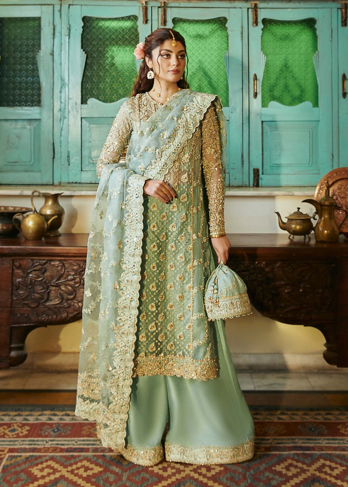 Model wearing light green Meera dress from Kanwal Malik, Afsheen Luxury Pret 2024 collection. Pakistani wedding clothes online in UK, elegant fashion.