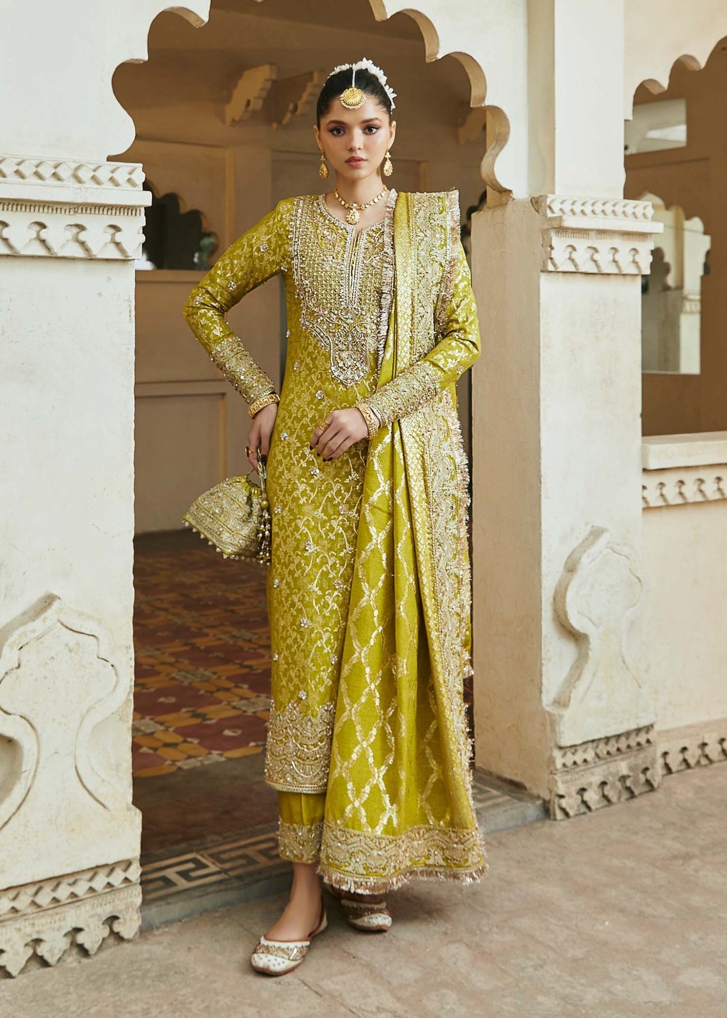 Model wearing mustard yellow Mushq dress from Kanwal Malik, Afsheen Luxury Pret 2024 collection. Pakistani clothes online in UK, wedding clothes.