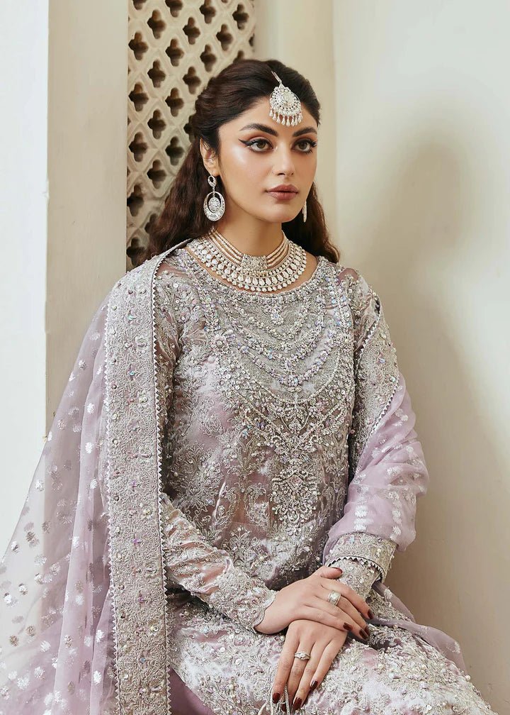 Model wearing lavender Nigar dress from Kanwal Malik, Afsheen Luxury Pret 2024 collection. Pakistani clothes online in UK, wedding clothes.