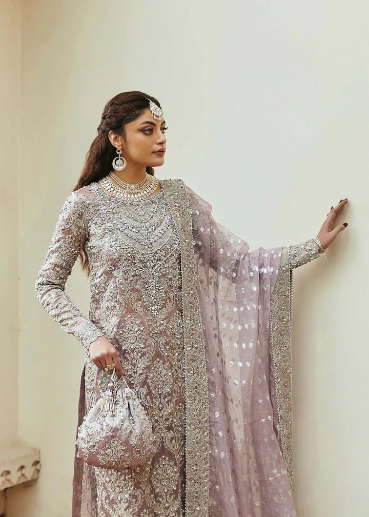 Model wearing lavender Nigar dress from Kanwal Malik, Afsheen Luxury Pret 2024 collection. Pakistani clothes online in UK, wedding clothes.