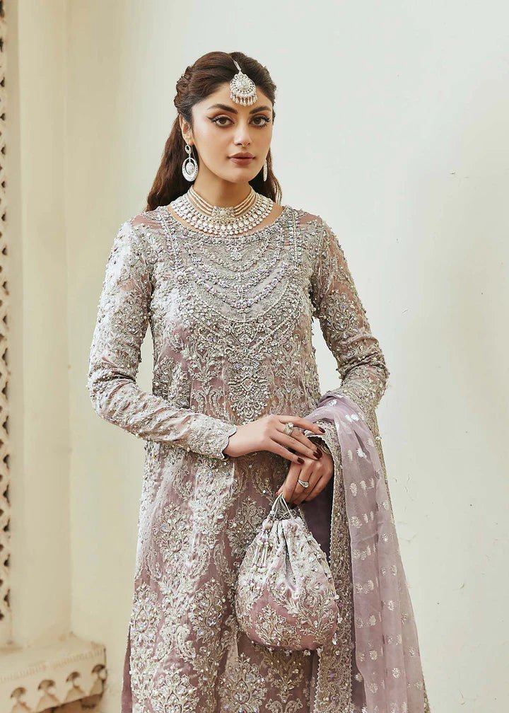 Model wearing lavender Nigar dress from Kanwal Malik, Afsheen Luxury Pret 2024 collection. Pakistani clothes online in UK, wedding clothes.