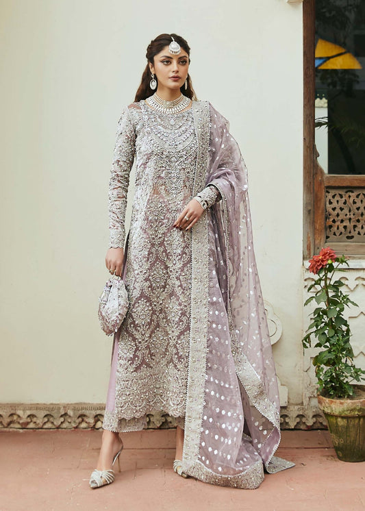 Model wearing lavender Nigar dress from Kanwal Malik, Afsheen Luxury Pret 2024 collection. Pakistani clothes online in UK, wedding clothes.