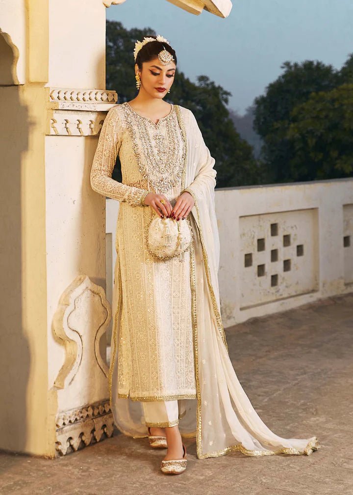 Model wearing ivory Roshan dress from Kanwal Malik, Afsheen Luxury Pret 2024 collection. Pakistani clothes online in UK, wedding clothes.