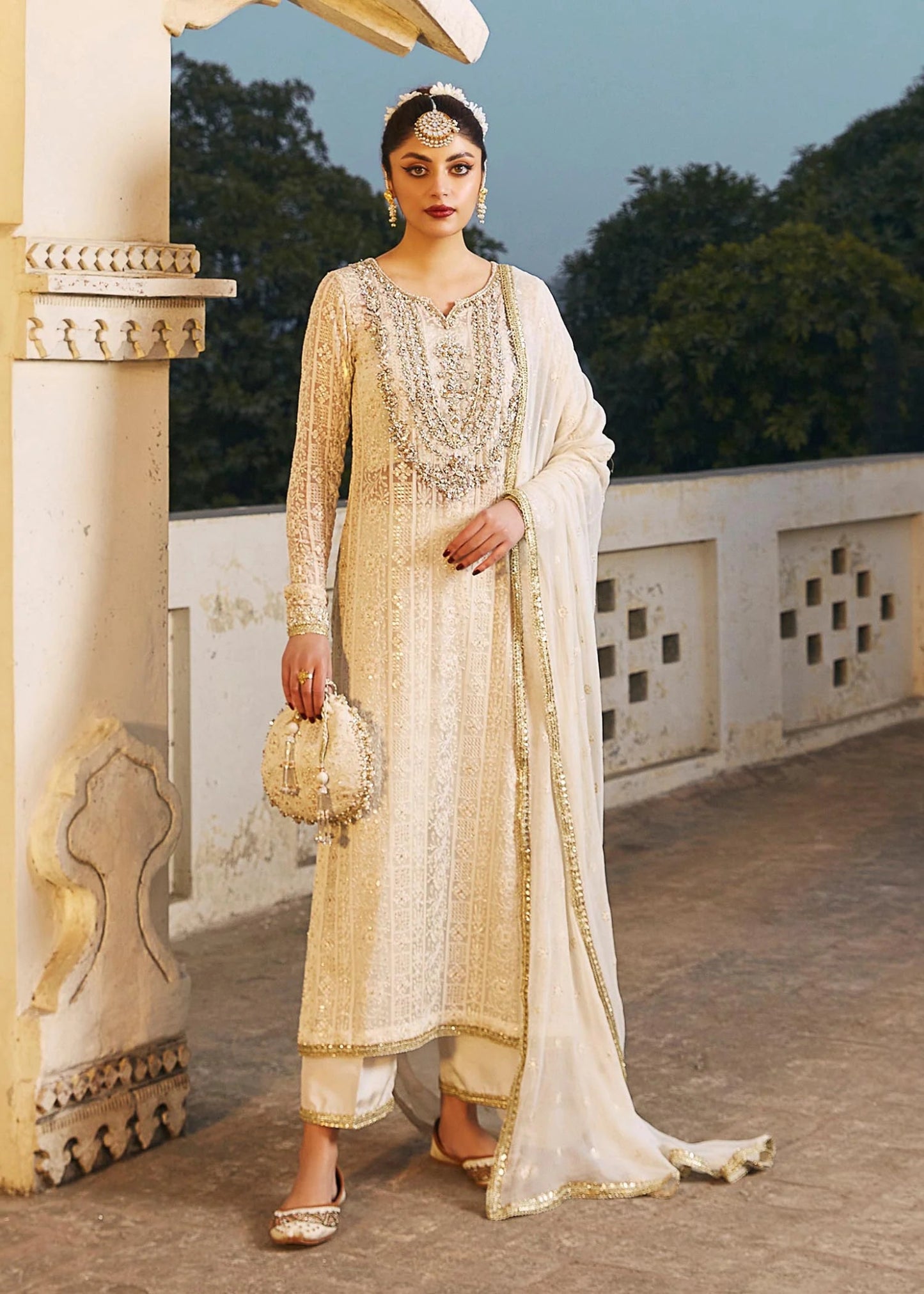 Model wearing ivory Roshan dress from Kanwal Malik, Afsheen Luxury Pret 2024 collection. Pakistani clothes online in UK, wedding clothes.