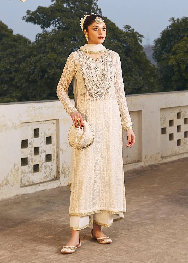 Model wearing ivory Roshan dress from Kanwal Malik, Afsheen Luxury Pret 2024 collection. Pakistani clothes online in UK, wedding clothes.