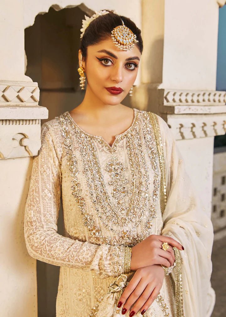 Model wearing ivory Roshan dress from Kanwal Malik, Afsheen Luxury Pret 2024 collection. Pakistani clothes online in UK, wedding clothes.