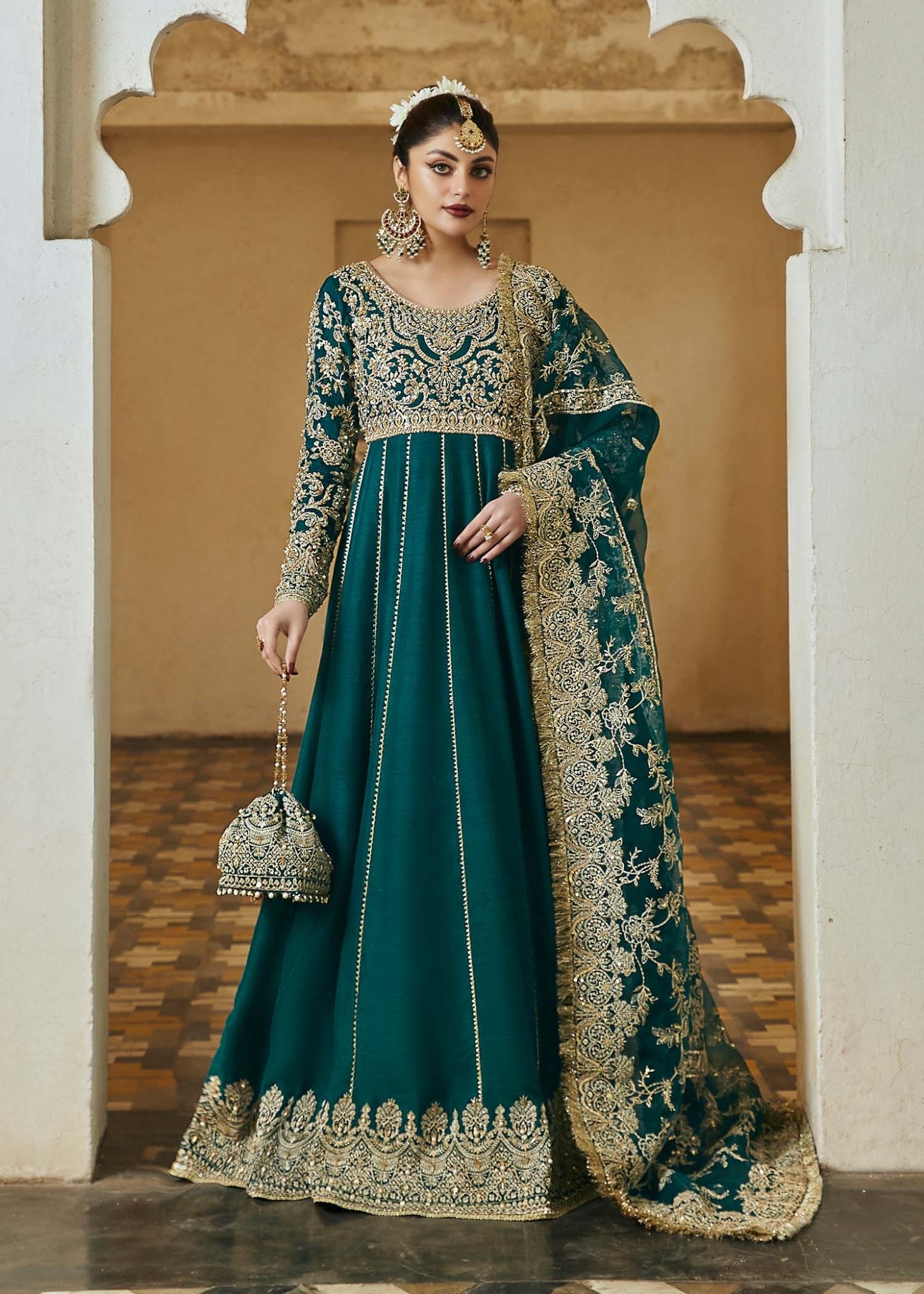 Model wearing teal Tammana dress from Kanwal Malik, Afsheen Luxury Pret 2024 collection. Pakistani clothes online in UK, wedding clothes.