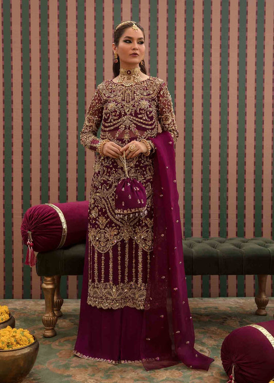 Model flaunting Kanwal Malik Angana '23 Anari dress, representing Pakistani wedding attire available online in the UK.