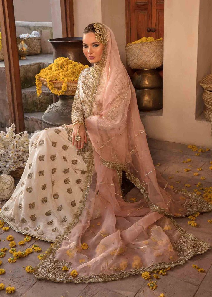 Model showcasing Kanwal Malik Angana '23 Nargis dress, epitomizing Pakistani wedding attire online in the UK.