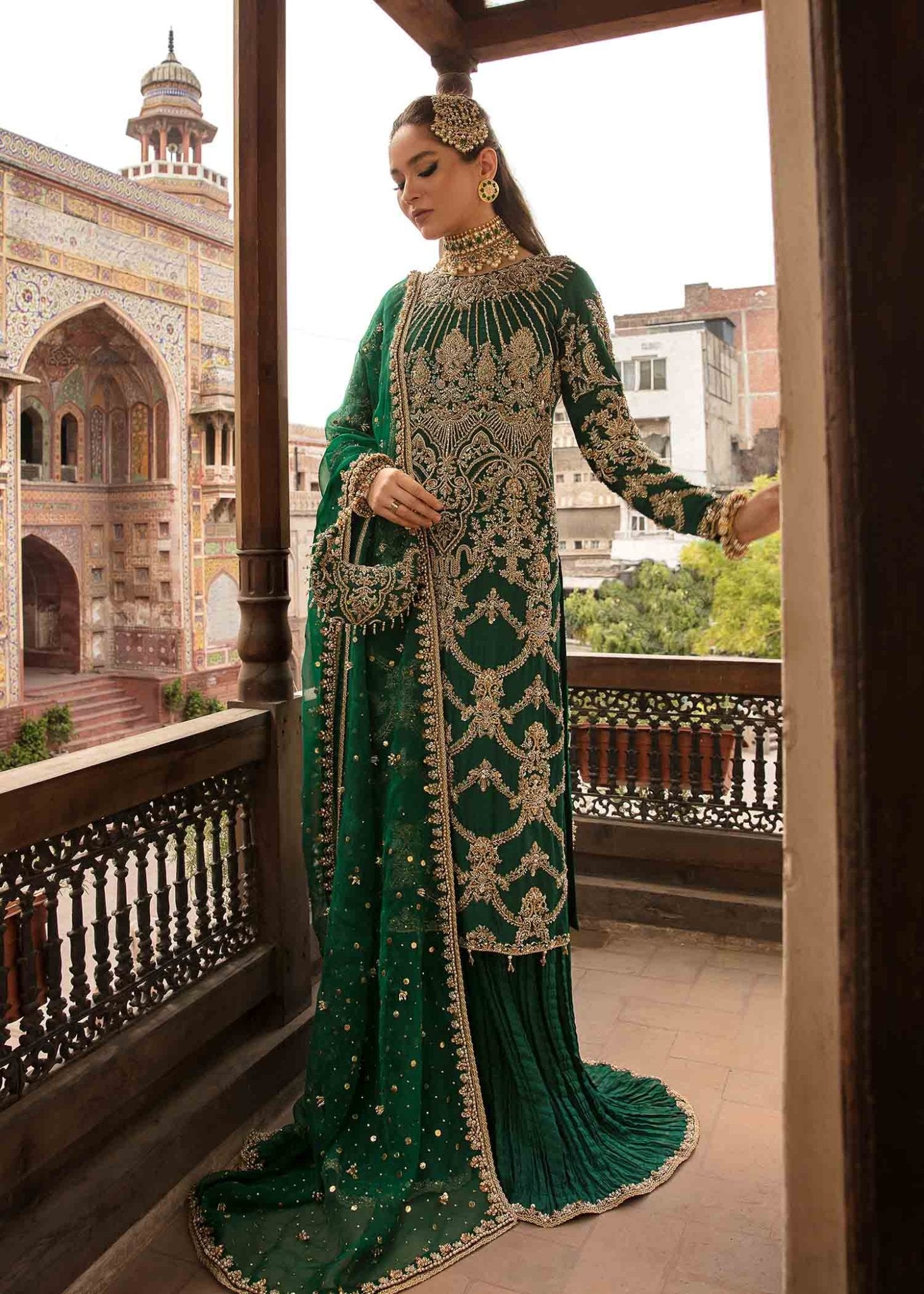 Model in Kanwal Malik's 'Zaytooni'—elegant Pakistani attire from Kanwal Malik UK collection.