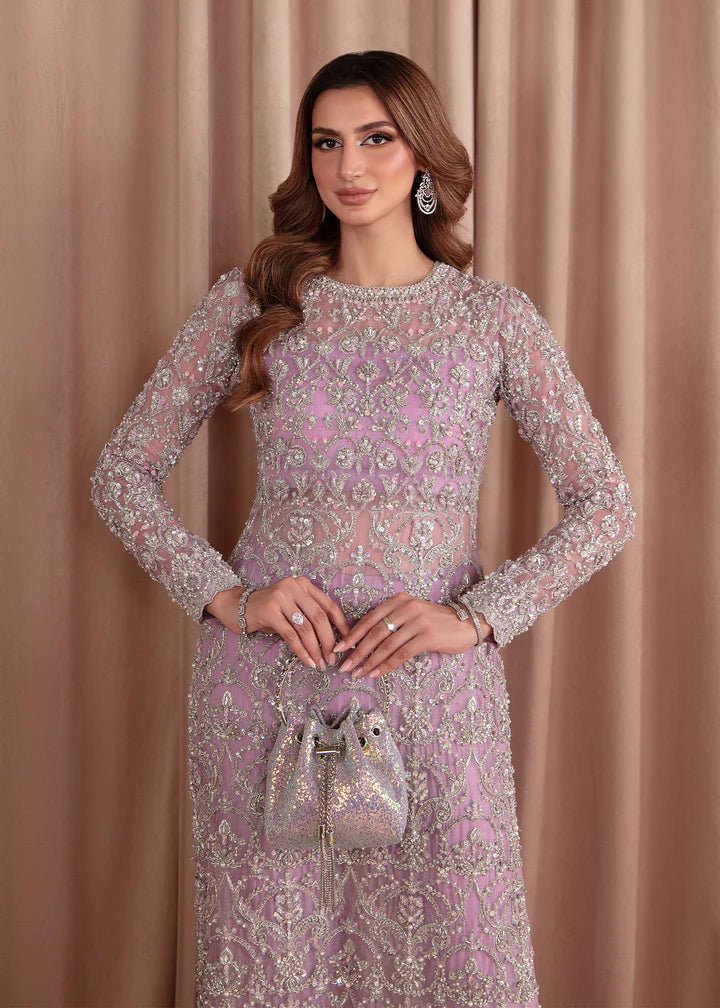 Model wearing Kanwal Malik Elara Luxury Pret '24 Eliza dress in lavender, showcasing Pakistani wedding clothes online in the UK.