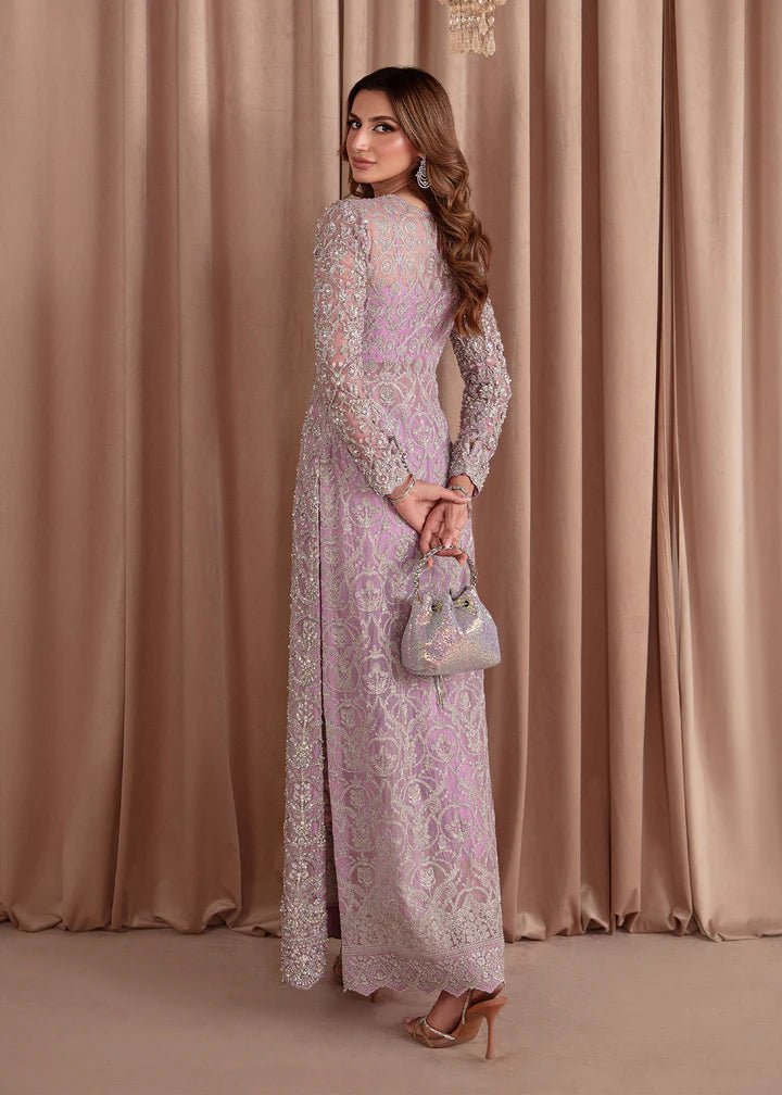 Model wearing Kanwal Malik Elara Luxury Pret '24 Eliza dress in lavender, showcasing Pakistani wedding clothes online in the UK.