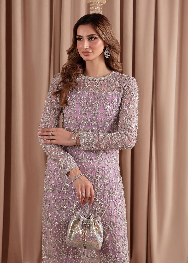 Model wearing Kanwal Malik Elara Luxury Pret '24 Eliza dress in lavender, showcasing Pakistani wedding clothes online in the UK.