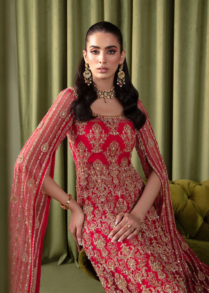 Model wearing Kanwal Malik Elara Luxury Pret '24 Mirage dress in red, showcasing Pakistani wedding clothes online in the UK.