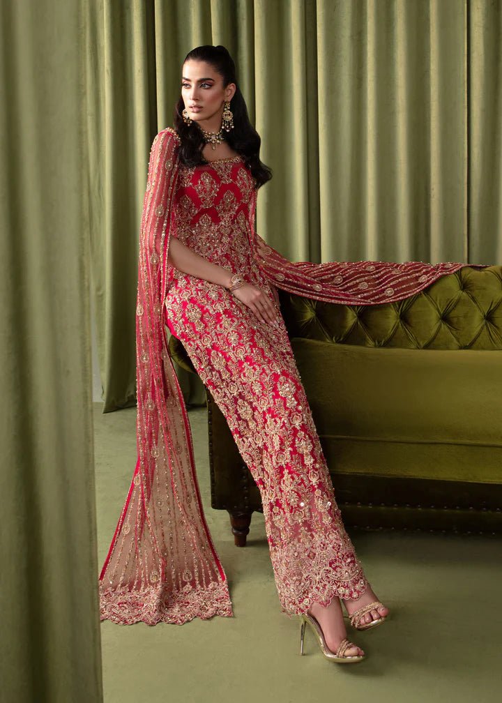 Model wearing Kanwal Malik Elara Luxury Pret '24 Mirage dress in red, showcasing Pakistani wedding clothes online in the UK.