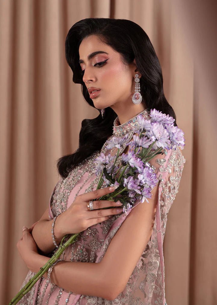 Model wearing Kanwal Malik Elara Luxury Pret '24 Valentina dress in blush pink, showcasing Pakistani wedding clothes online in the UK.