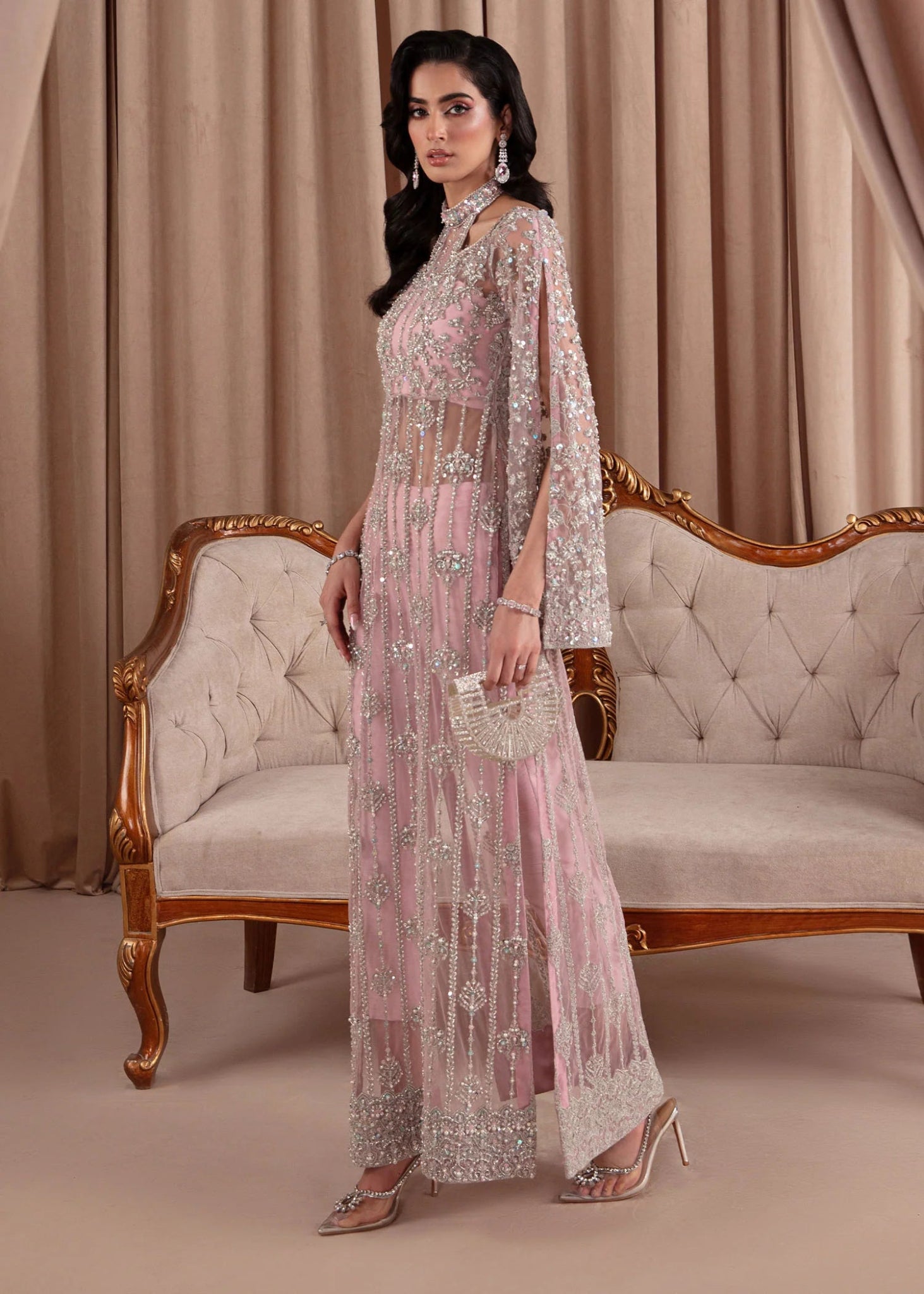 Model wearing Kanwal Malik Elara Luxury Pret '24 Valentina dress in blush pink, showcasing Pakistani wedding clothes online in the UK.