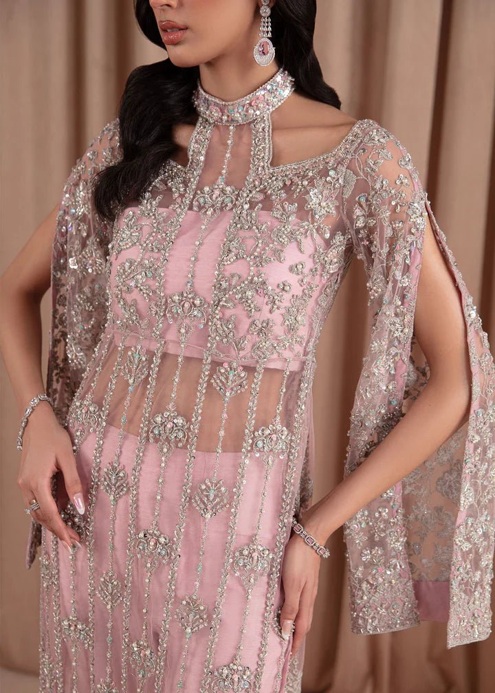 Model wearing Kanwal Malik Elara Luxury Pret '24 Valentina dress in blush pink, showcasing Pakistani wedding clothes online in the UK.