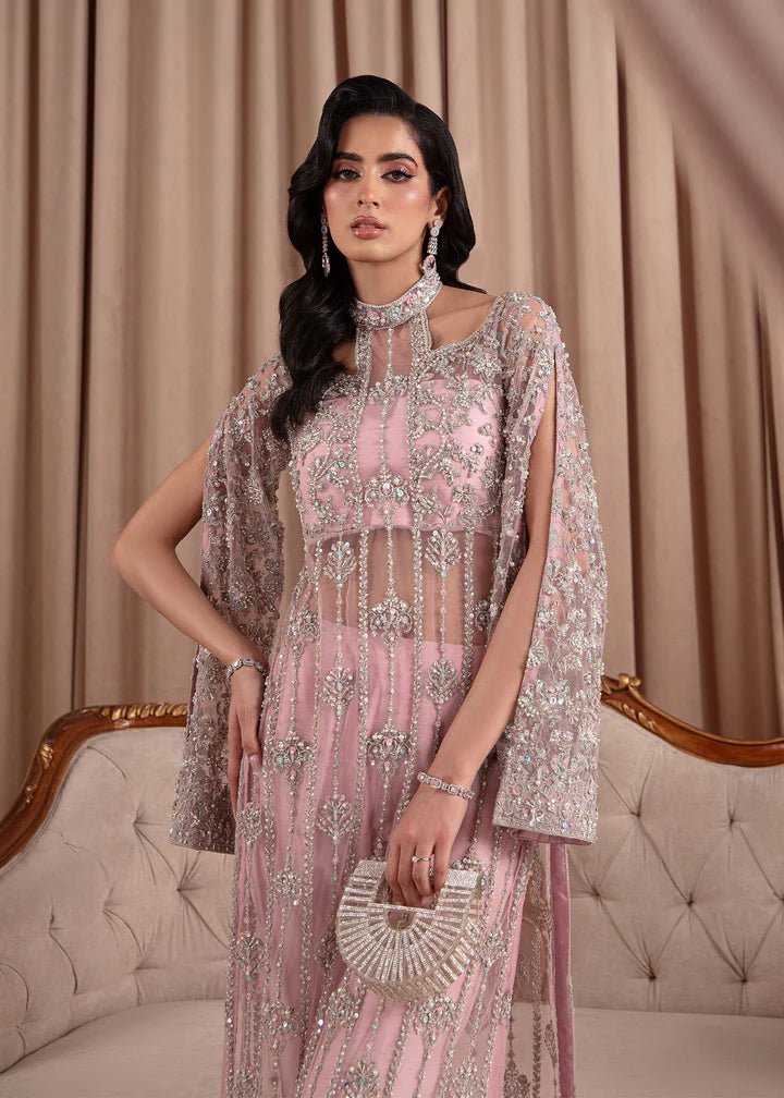 Model wearing Kanwal Malik Elara Luxury Pret '24 Valentina dress in blush pink, showcasing Pakistani wedding clothes online in the UK.