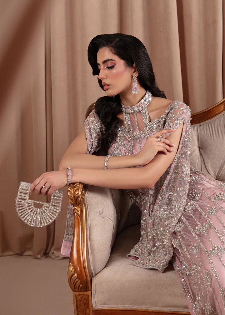 Model wearing Kanwal Malik Elara Luxury Pret '24 Valentina dress in blush pink, showcasing Pakistani wedding clothes online in the UK.