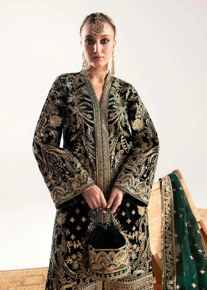 Model wearing emerald green Gazal dress from Kanwal Malik, Jugan Luxury Pret 2024 collection. Pakistani clothes online in UK, wedding clothes.