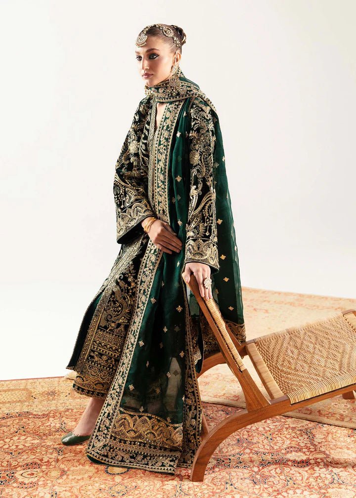 Model wearing emerald green Gazal dress from Kanwal Malik, Jugan Luxury Pret 2024 collection. Pakistani clothes online in UK, wedding clothes.