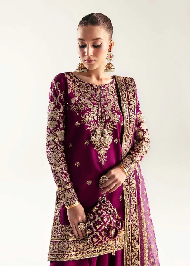 Model wearing deep purple Hania dress from Kanwal Malik, Jugan Luxury Pret 2024 collection. Pakistani clothes online in UK, wedding clothes.