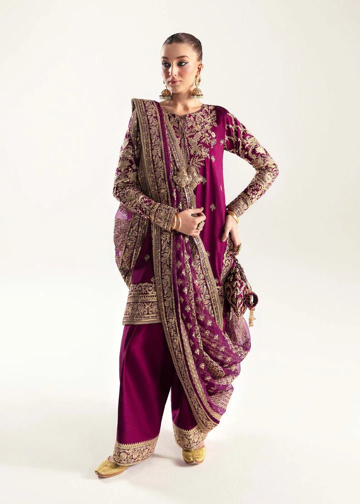 Model wearing deep purple Hania dress from Kanwal Malik, Jugan Luxury Pret 2024 collection. Pakistani clothes online in UK, wedding clothes.