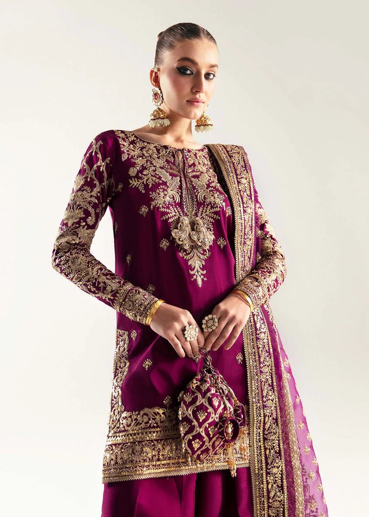 Model wearing deep purple Hania dress from Kanwal Malik, Jugan Luxury Pret 2024 collection. Pakistani clothes online in UK, wedding clothes.