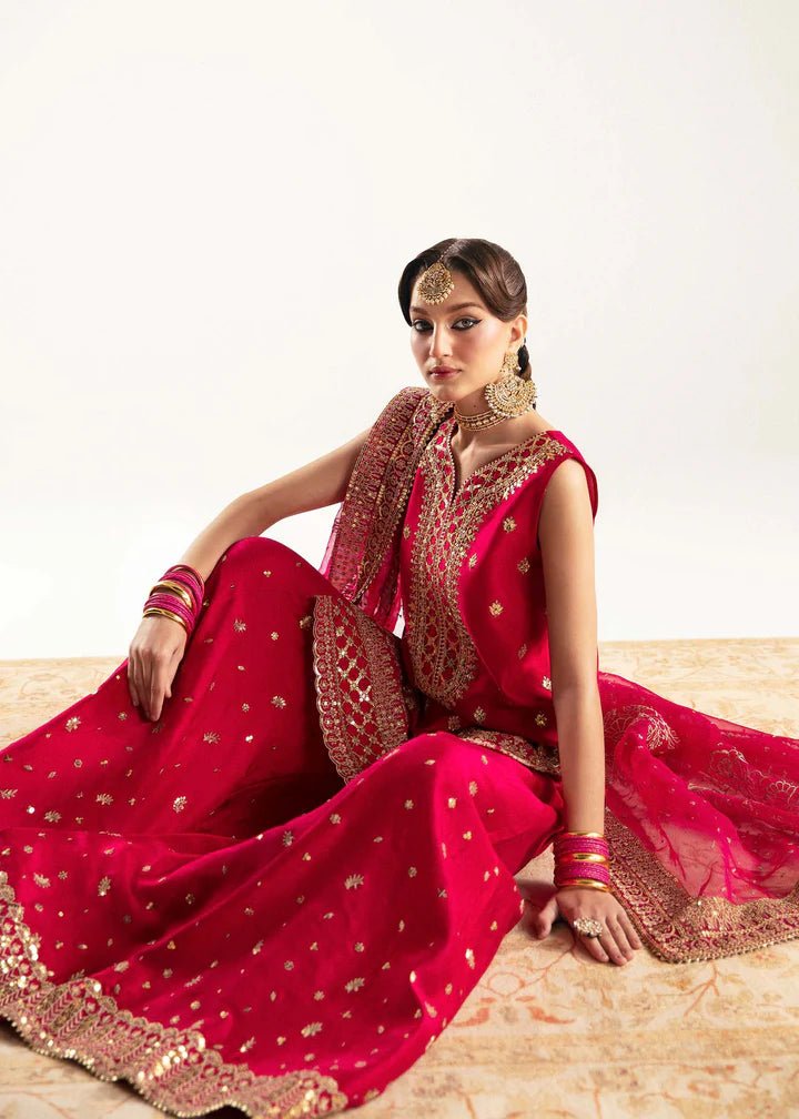 Model wearing red Irina dress from Kanwal Malik, Jugan Luxury Pret 2024 collection. Pakistani clothes online in UK, wedding clothes.