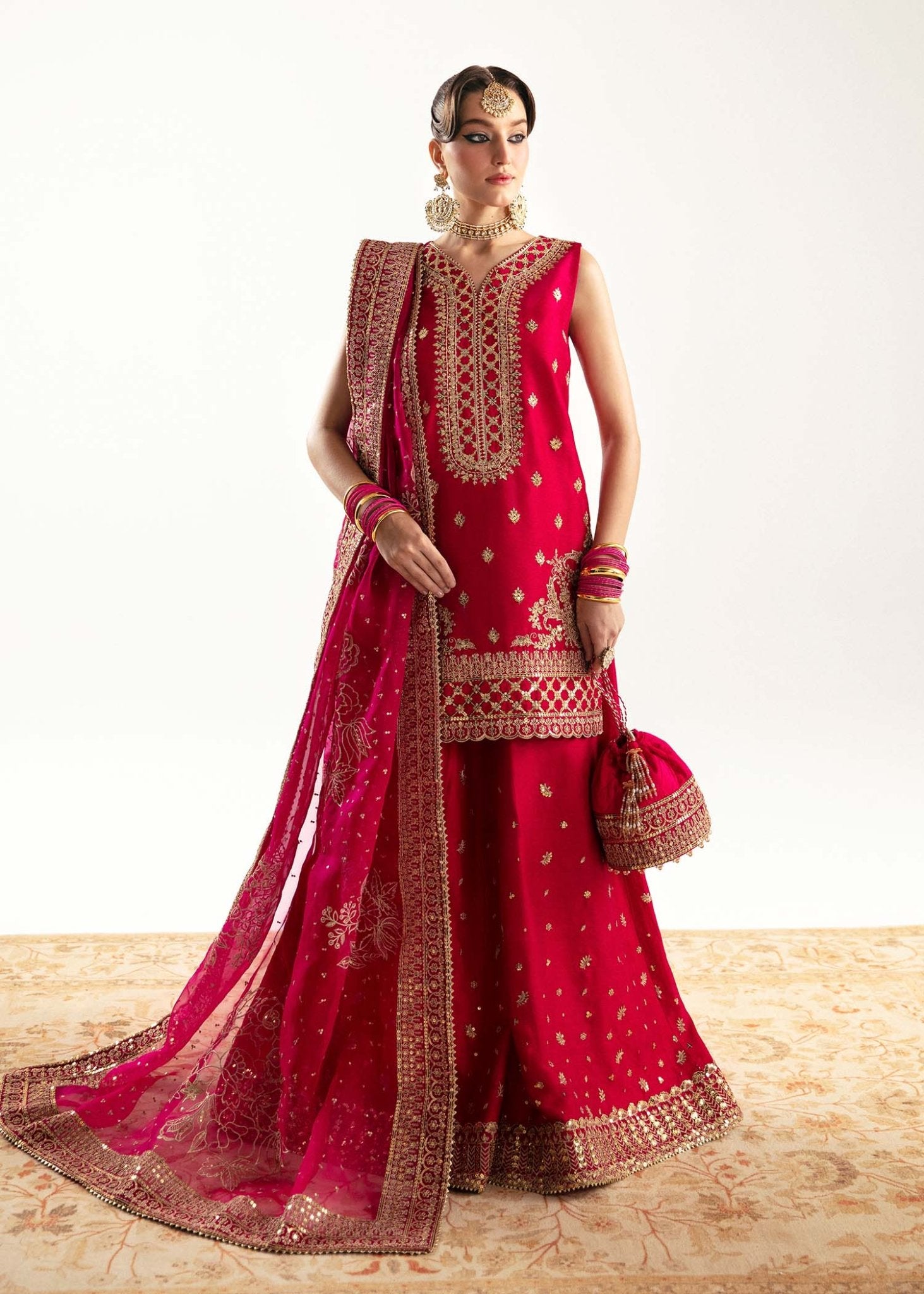 Model wearing red Irina dress from Kanwal Malik, Jugan Luxury Pret 2024 collection. Pakistani clothes online in UK, wedding clothes.