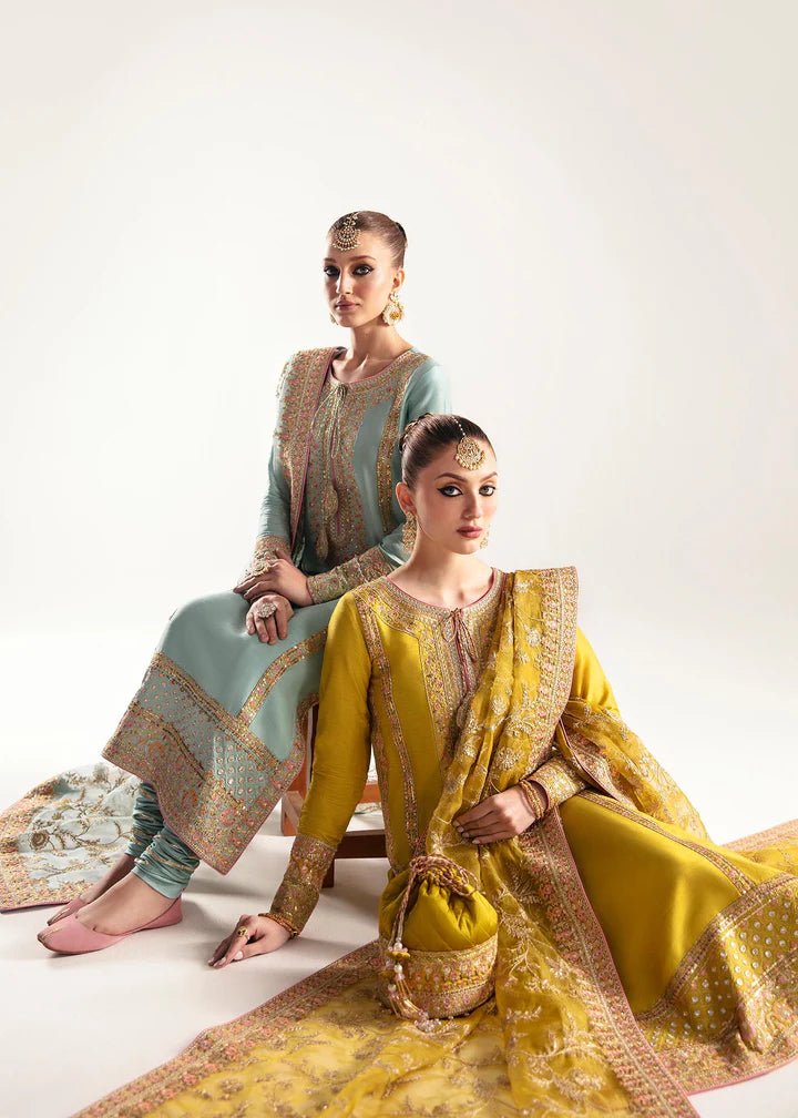 Model wearing a yellow Mahpara dress from Kanwal Malik's Jugan Luxury Pret 2024 collection. Pakistani designer clothes available online in the UK, perfect for weddings.