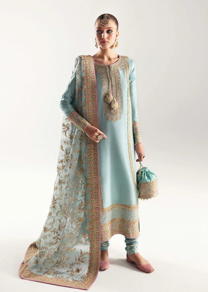 Model wearing light blue Manjeh dress from Kanwal Malik, Jugan Luxury Pret 2024 collection. Pakistani clothes online in UK, wedding clothes.