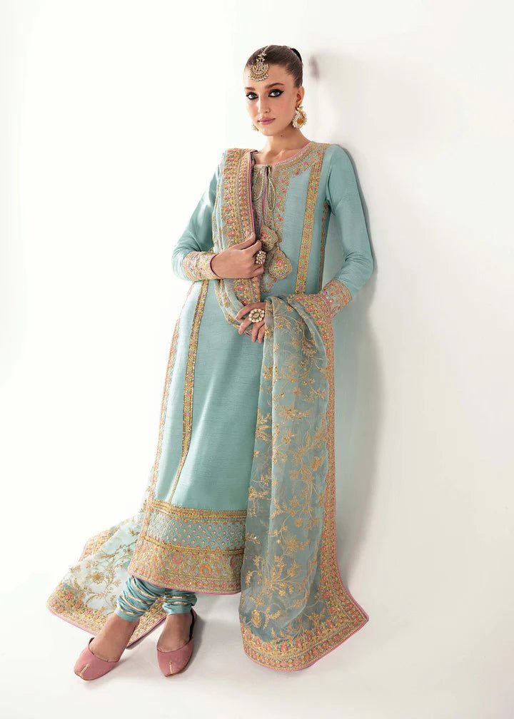 Model wearing light blue Manjeh dress from Kanwal Malik, Jugan Luxury Pret 2024 collection. Pakistani clothes online in UK, wedding clothes.