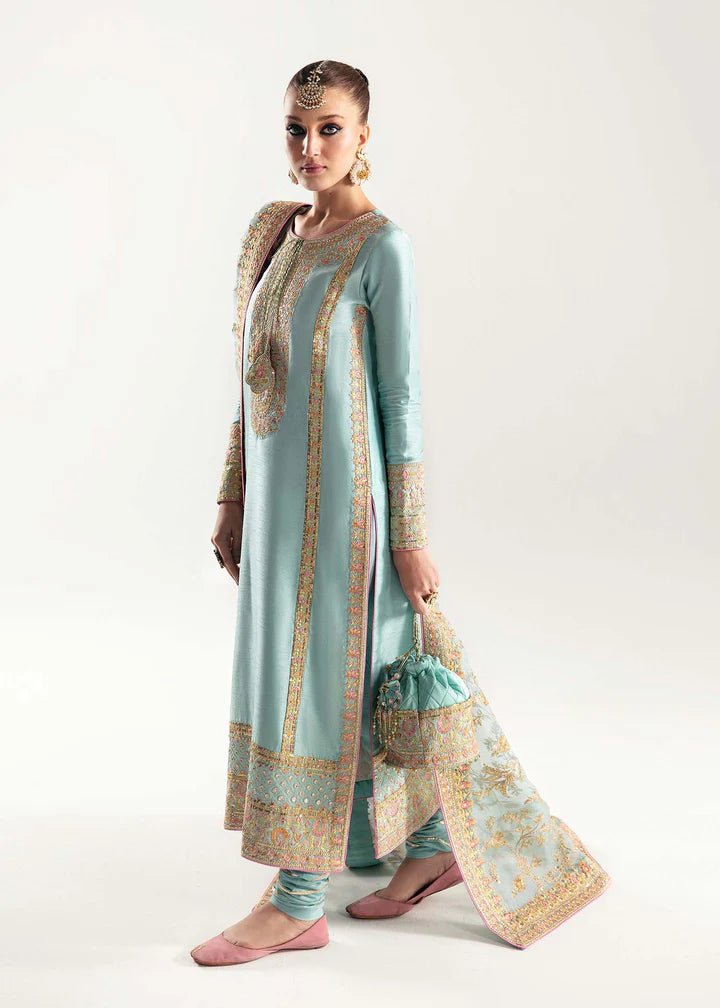 Model wearing light blue Manjeh dress from Kanwal Malik, Jugan Luxury Pret 2024 collection. Pakistani clothes online in UK, wedding clothes.