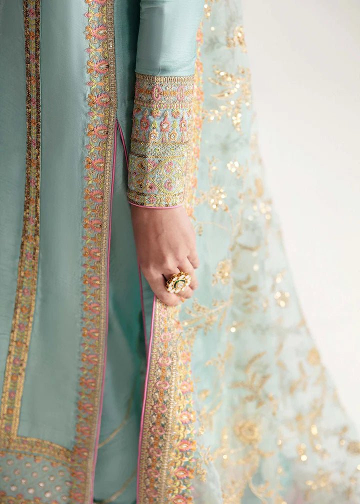 Model wearing light blue Manjeh dress from Kanwal Malik, Jugan Luxury Pret 2024 collection. Pakistani clothes online in UK, wedding clothes.