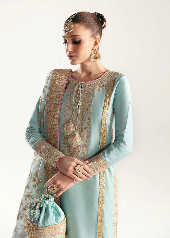 Model wearing light blue Manjeh dress from Kanwal Malik, Jugan Luxury Pret 2024 collection. Pakistani clothes online in UK, wedding clothes.