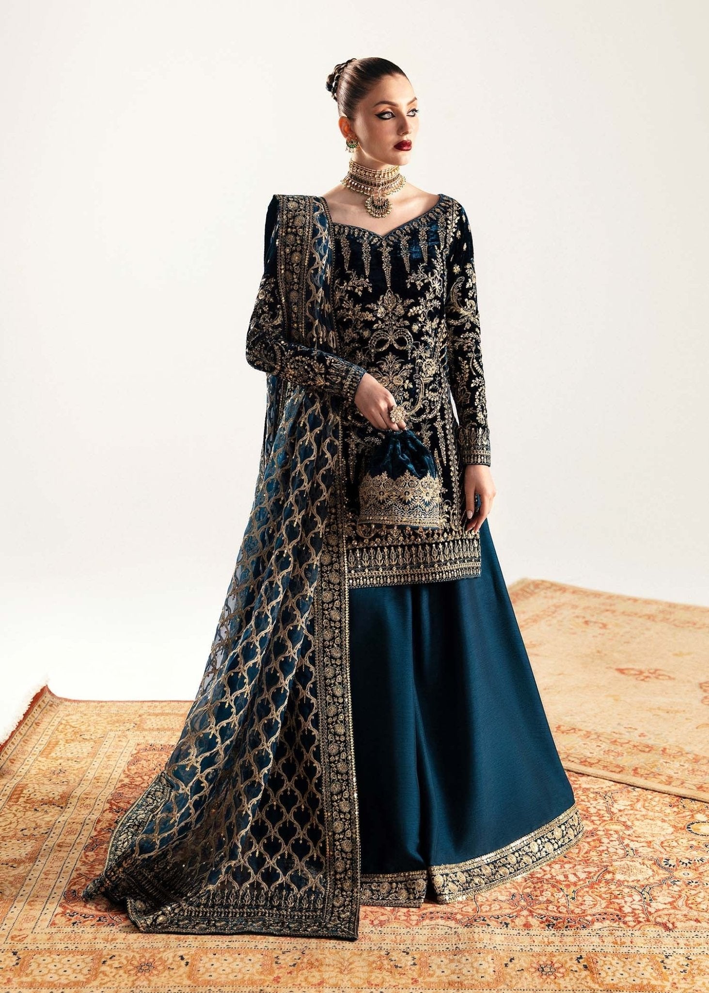 Model wearing navy blue Nazmi dress from Kanwal Malik, Jugan Luxury Pret 2024 collection. Pakistani clothes online in UK, wedding clothes.