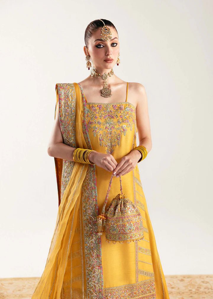 Model wearing yellow Nehal dress from Kanwal Malik, Jugan Luxury Pret 2024 collection. Pakistani clothes online in UK, wedding clothes.