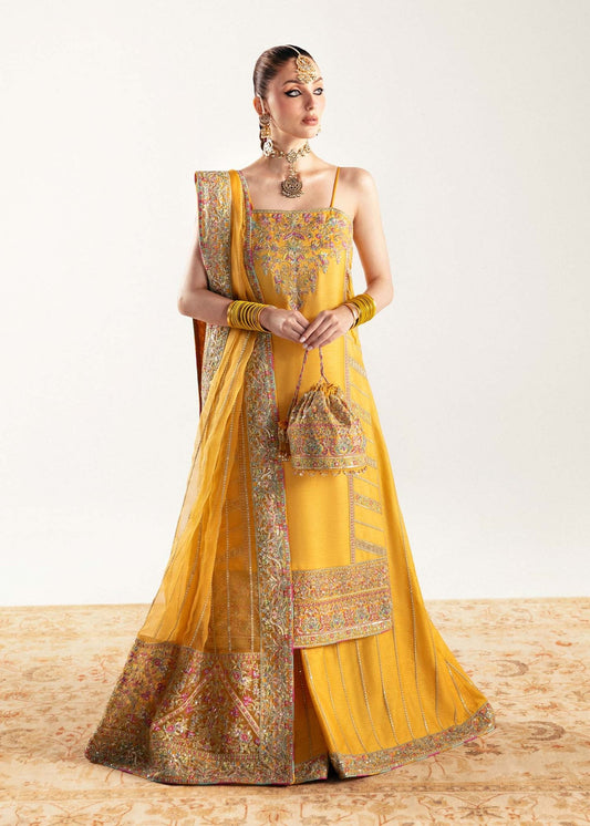 Model wearing yellow Nehal dress from Kanwal Malik, Jugan Luxury Pret 2024 collection. Pakistani clothes online in UK, wedding clothes.