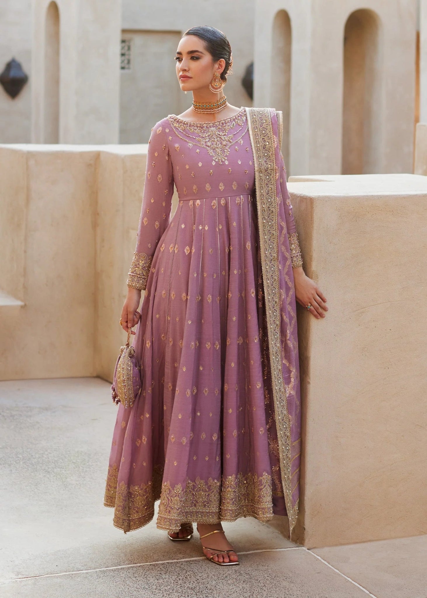 Model wearing Vaneeza from Kanwal Malik's Laira '24, featuring luxurious design. Pakistani clothes online in UK.