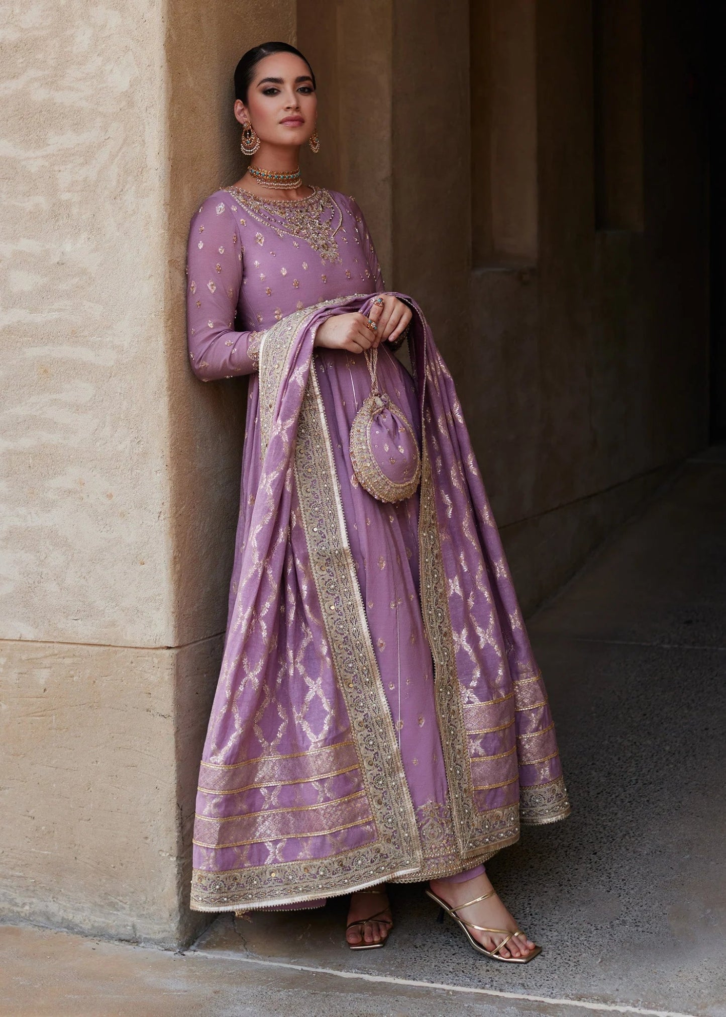 Model wearing Vaneeza from Kanwal Malik's Laira '24, featuring luxurious design. Pakistani clothes online in UK.