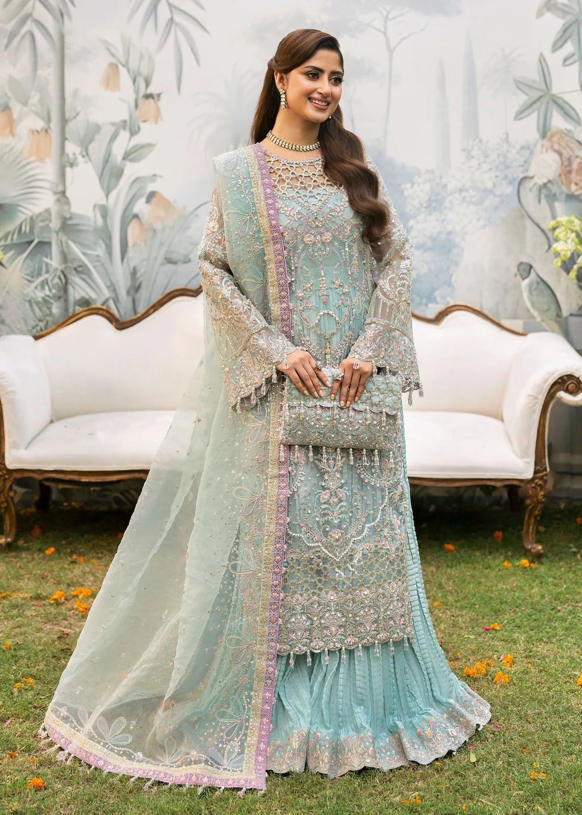 Model wearing Kanwal Malik Maahi Wedding Festive '24 AYZEL, a stunning pastel mint green ensemble with intricate embellishments, perfect for weddings. Available for Pakistani clothes online in the UK.