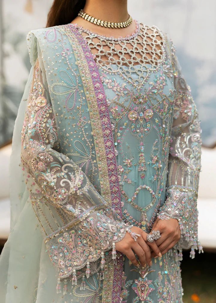 Model wearing Kanwal Malik Maahi Wedding Festive '24 AYZEL, a stunning pastel mint green ensemble with intricate embellishments, perfect for weddings. Available for Pakistani clothes online in the UK.